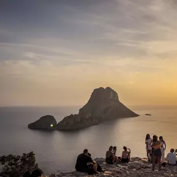 Ibiza, Spain - August 26th 2024 - View of Es Vedra island and people watching sunset Uploaded for App Use