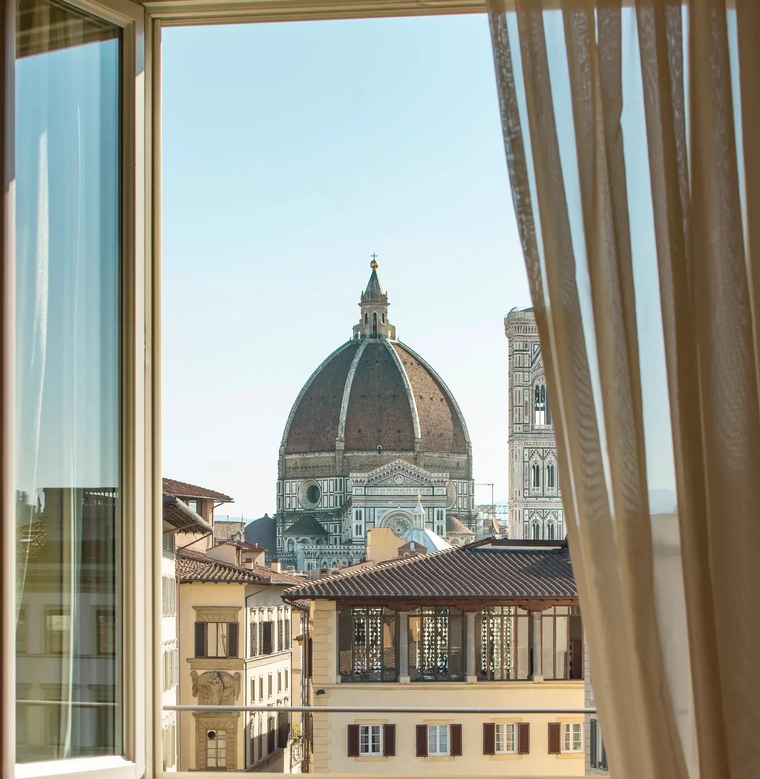 A view of a great Renaissance-style dome from a hotel window