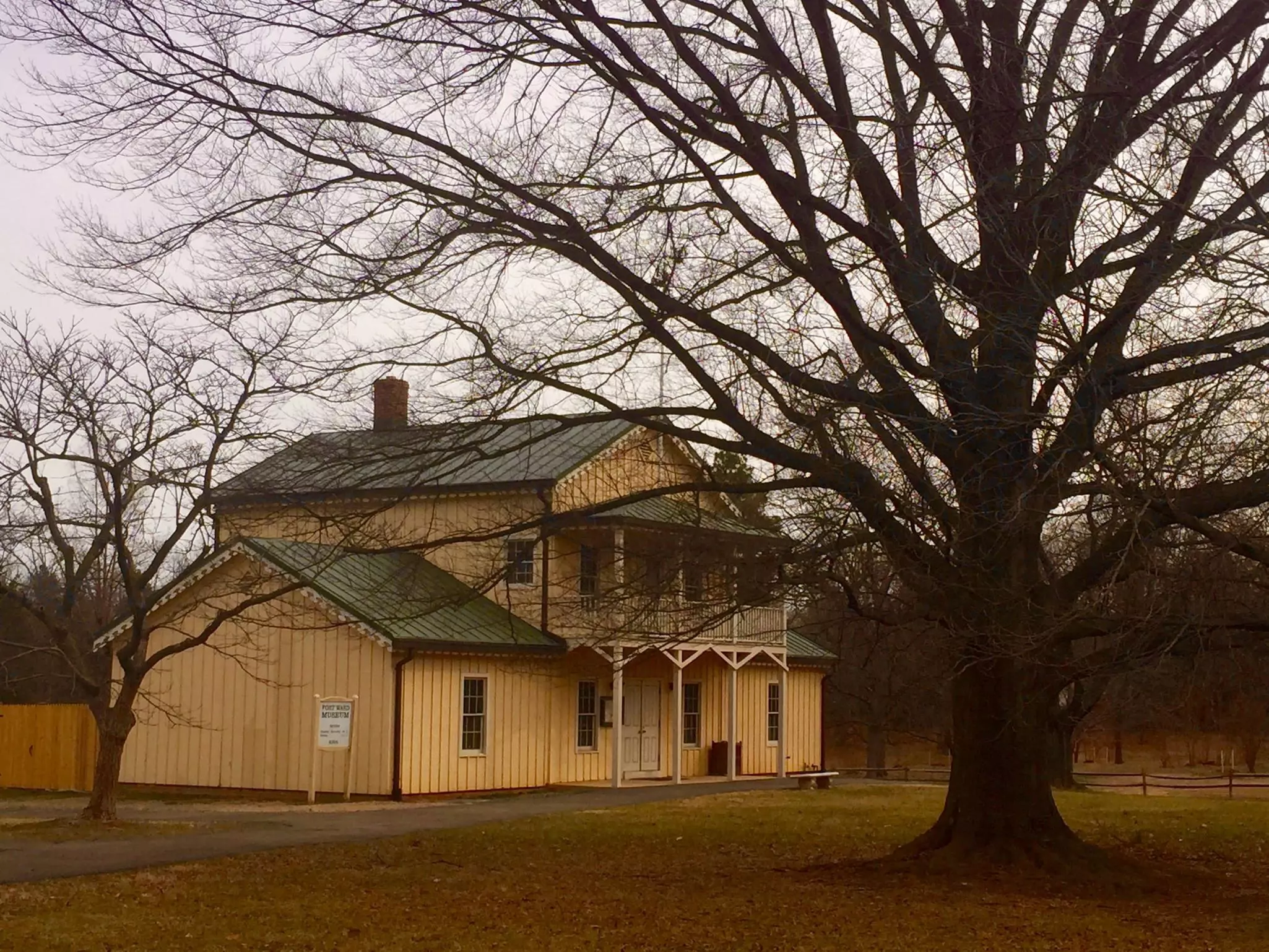 Fort Ward Museum, a small tan-colored building with a dark green roof