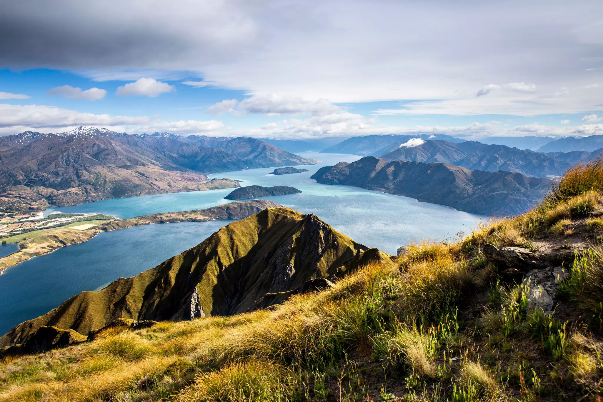 Lake Wanaka, New Zealand at sunrise from Roys Peak Hike shows just how much water there is to explore by kayak ©Joshua Small-Photographer/Shutterstock