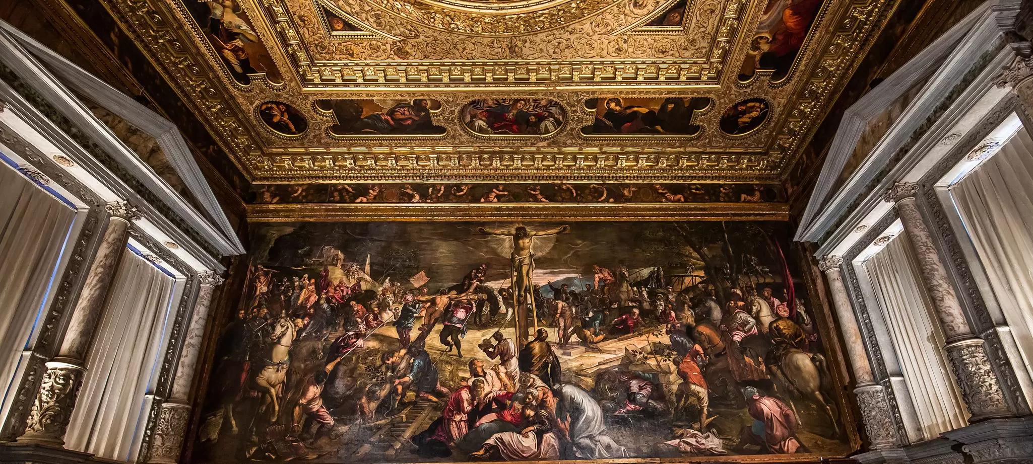 Tintoretto's 'Crucifixion' in the Sala dell'Albergo in the Scuola Grande di San Rocco in Venice, Italy.