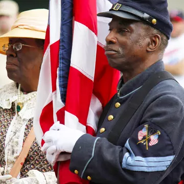 Philadelphia, PA, USA - June 14, 2019: Active members of the U.S. Armed Forces, veterans and historical re-enactors commemorate Flag Day at the National Constitution Center, in Philadelphia, Pennsylvania.
1155976713