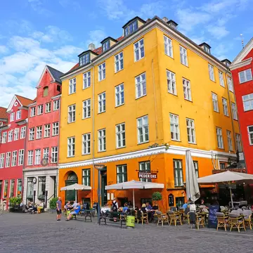 COPENHAGEN, DENMARK -15 MAY 2018- View of colorful buildings lining the Grabrodretorv Square, a landmark public square in Copenhagen, Denmark.