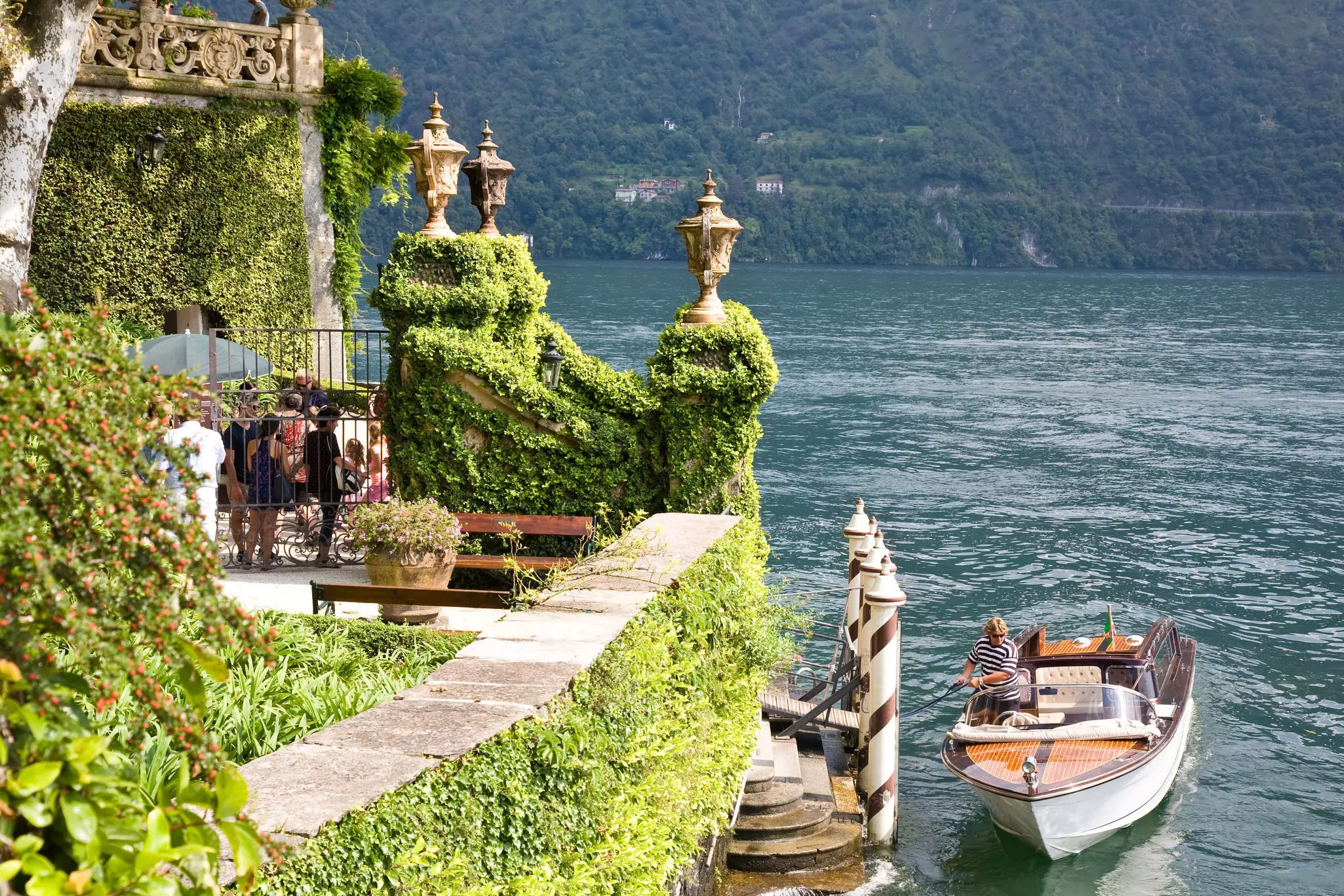 A boat by the waterfront entrance of the famous Villa Balbianello on the Como Lake in northern Italy.