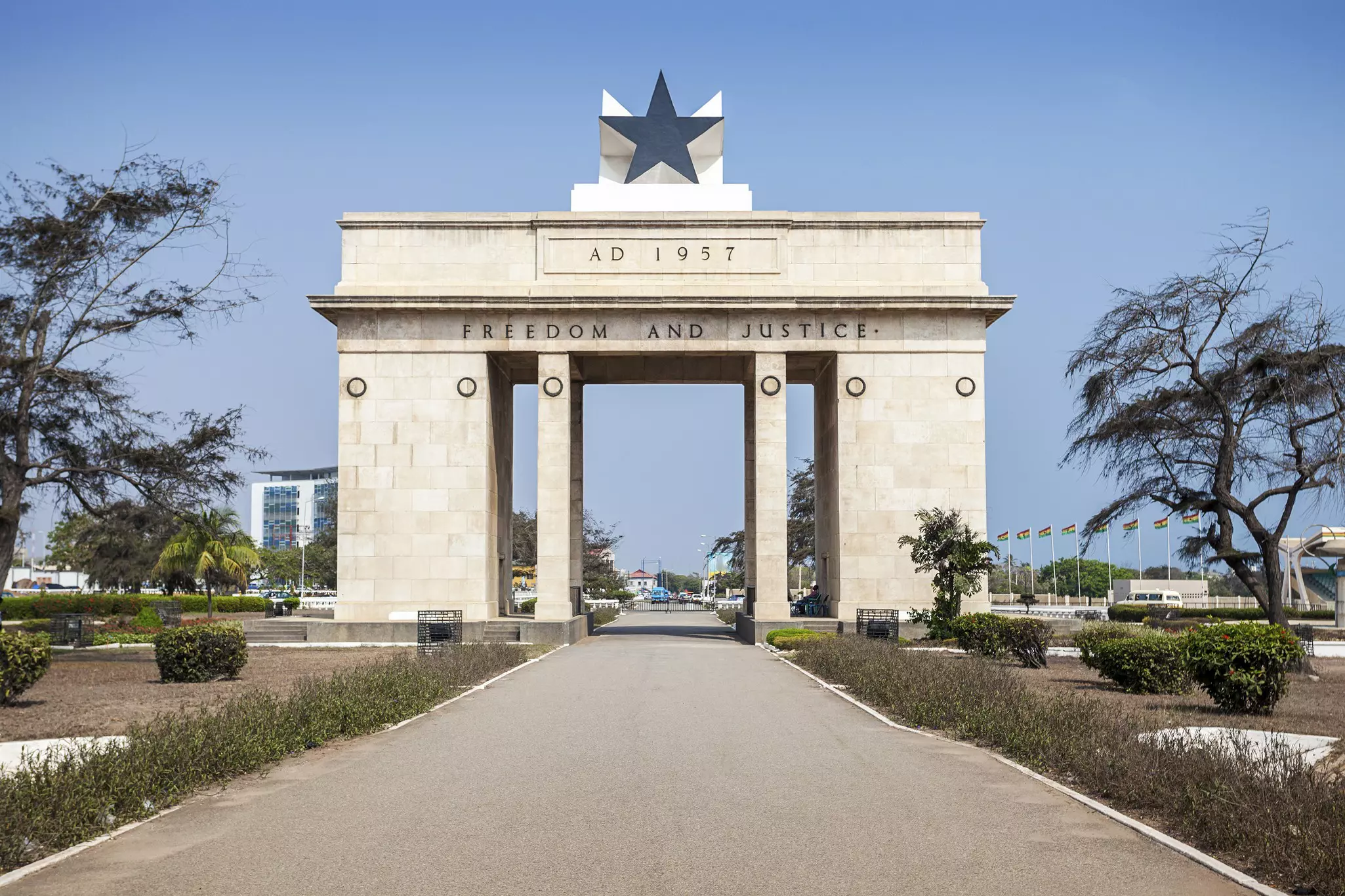 Independence Arch in Black Star Square. This is a white structure with the phrase "Freedom and Justice" on it and a black star at the top.