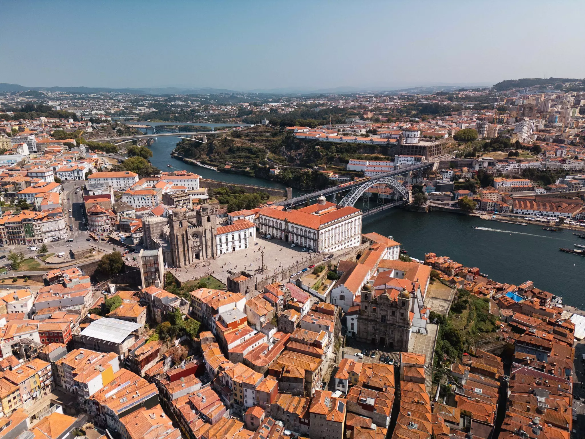 The Dom Luis I Bridge amidst the orange roofs of Porto