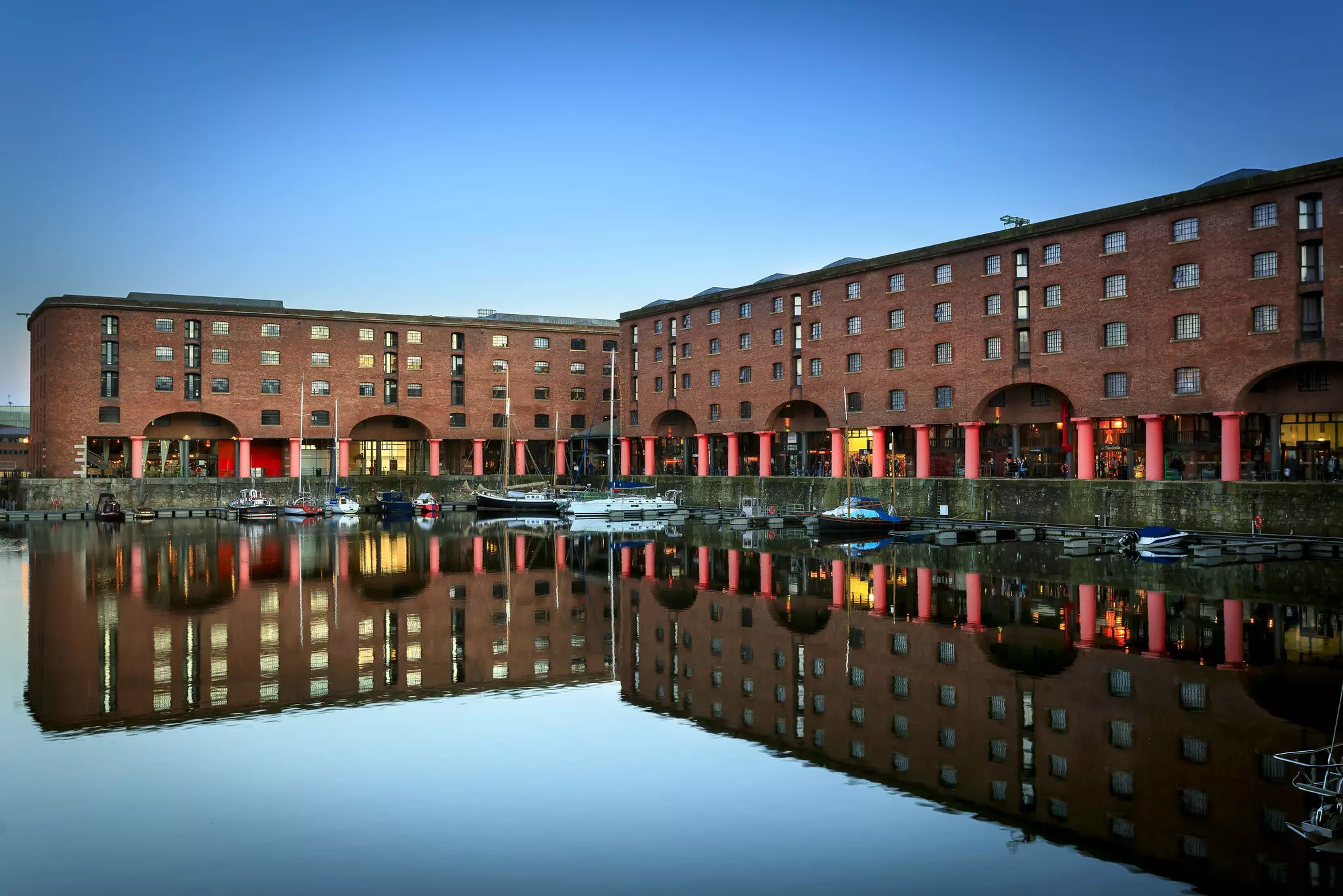 Reflection of warehouses in the Albert Dock area of Liverpool England.