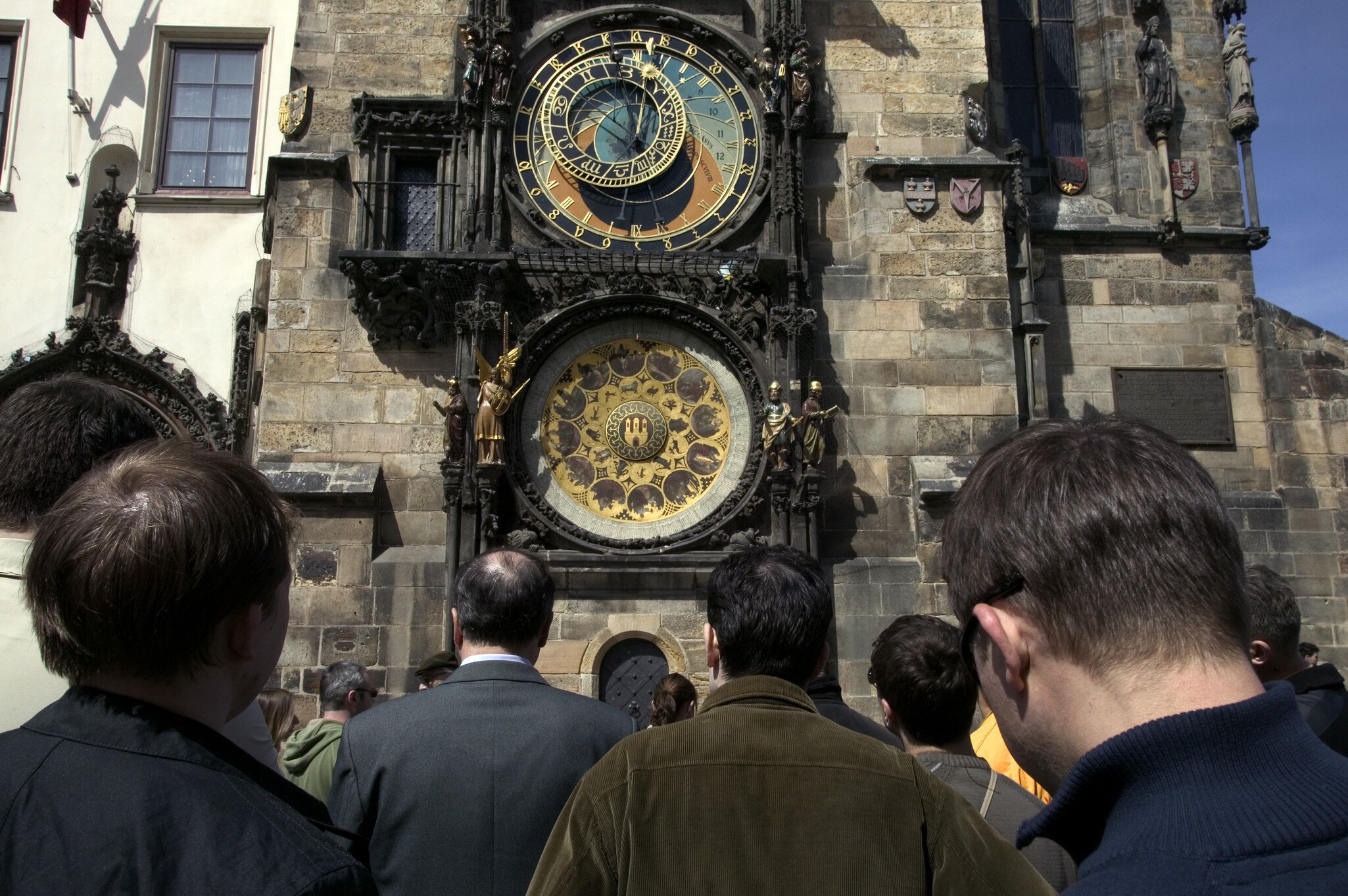 Tourists waiting, Astronomical Clock, Old Town Square. Prague, Czech Republic.