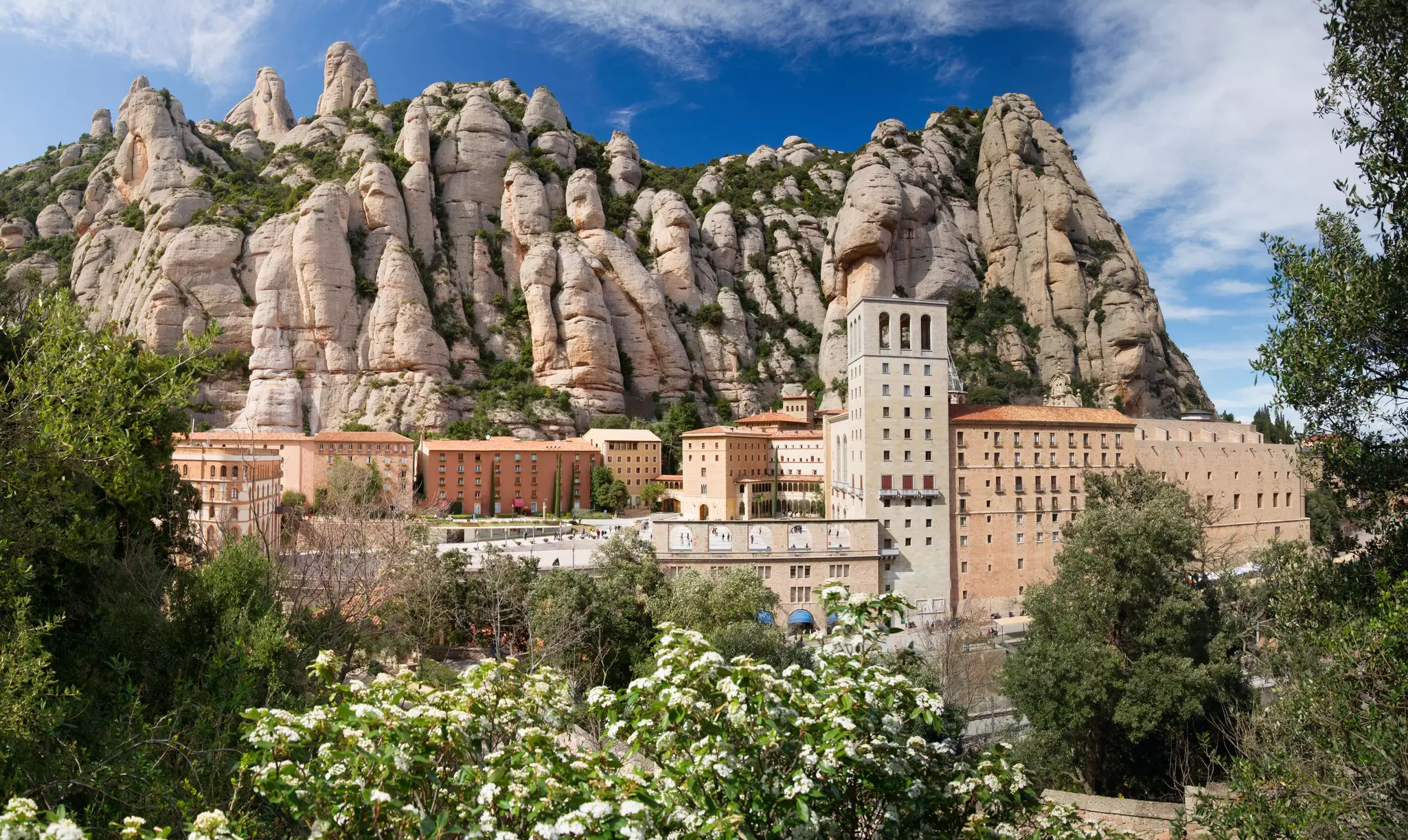 View of the Monestir de Montserrat against the impressive rock formations near Barcelona, Spain.