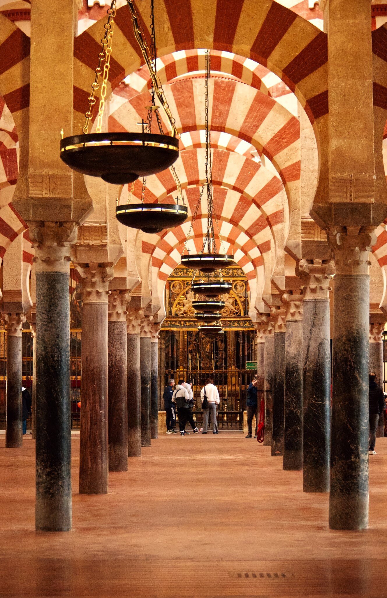 View of the striped arches of the Mezquita in Córdoba, Spain.