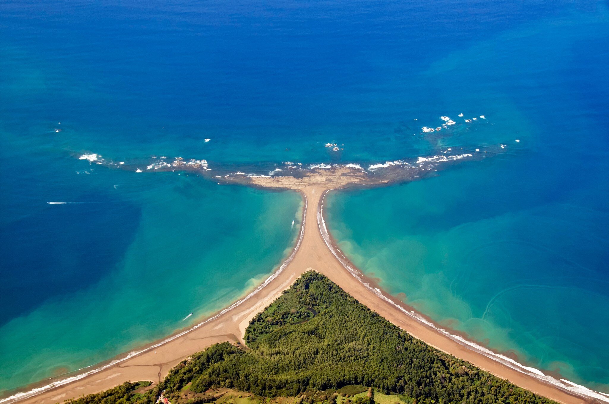Costa Rica, Whale’s Tail-like formation of coast at the Marino Ballena National Park, Costa Ballena, Uvita beach on left, Hermosa beach on right.