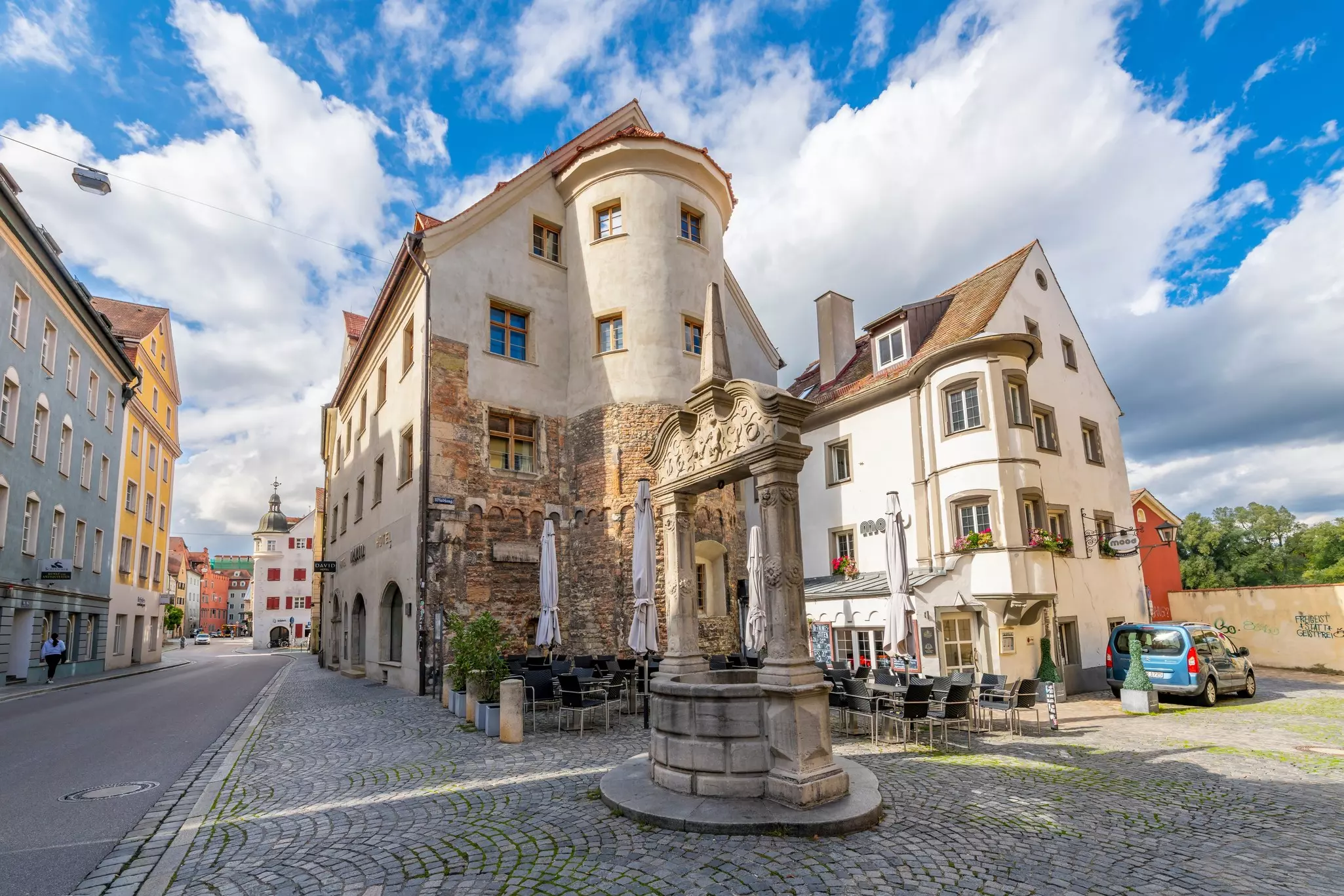 The ancient Porta Praetoria, the remaining Roman wall from AD 179, alongside the Wiedfangbrunnen Well in the Old Town Alstadt district of Regensburg, Germany © Kirk Fisher/Shutterstock