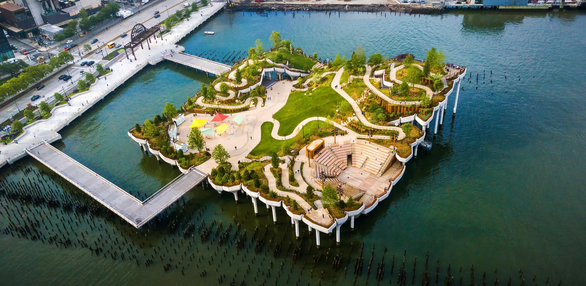 Aerial view of Little Island park at Pier 55 in New York, an artificial island park in the Hudson River west of Manhattan in New York City.