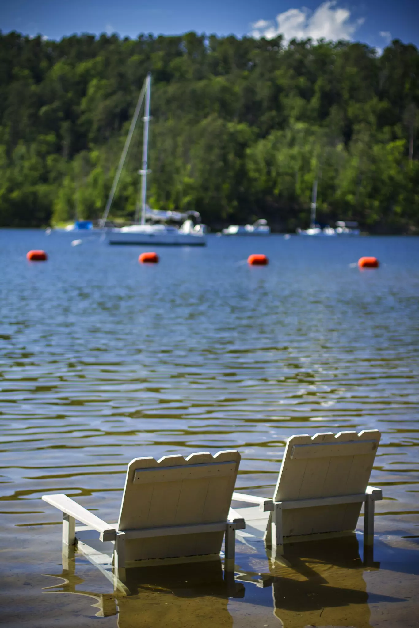 Chairs in the water at Lake Ouachita, Arkansas