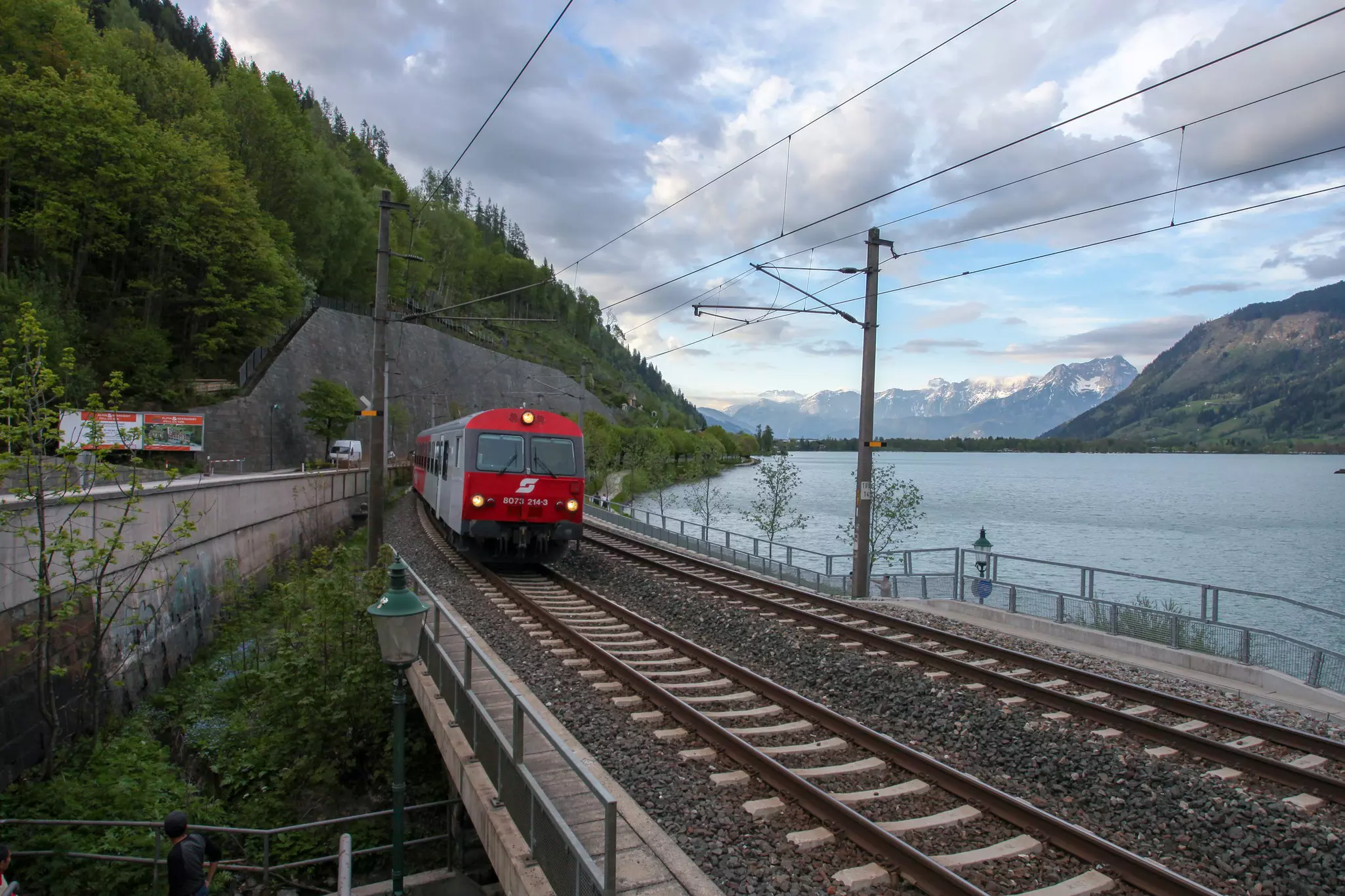Passing through Zell am See, boats and swimmers are just beyond the windows of your train car © Eddy H / Shutterstock