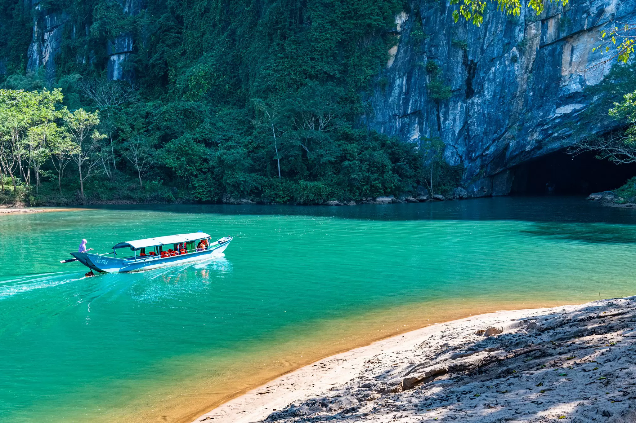 A boat heading into Phong Nha Cave in Phong Nha-Ke Bang National Park, Vietnam. Westend61/Getty Images