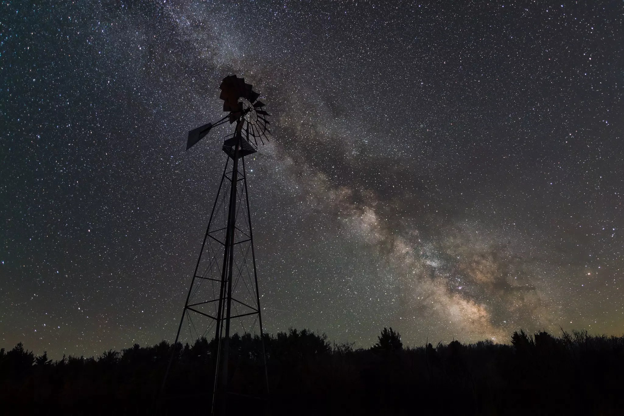 Silhouette of a windmill at Cherry Springs State Park at night with the Milky Way, Philadelphia