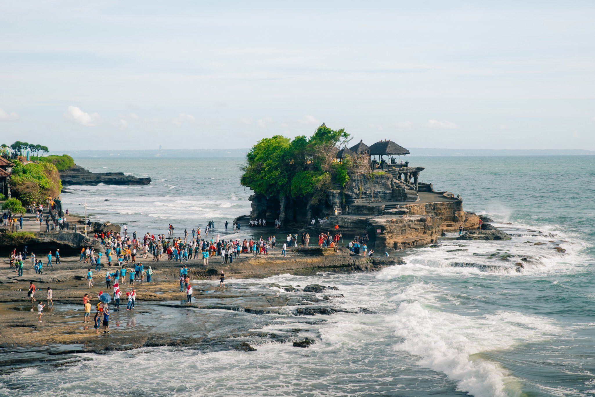 Pura Tanah Lot Temple and rock formation in Bali island in Indonesia ß maz 2 2024. High quality photo, License Type: media, Download Time: 2026-02-06T17:25:21.000Z, User: meg3348277, Editorial: true, purchase_order: 56530 - Guidebooks, job: Global Publishing-WIP, client: Lonely Planet – Bali, Lombok & Nusa Tenggara 20, other: Megan Cassidy
