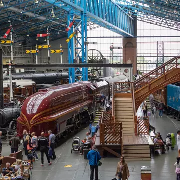 Historic steam locomotives and coaches in the National Railway Museum, York.