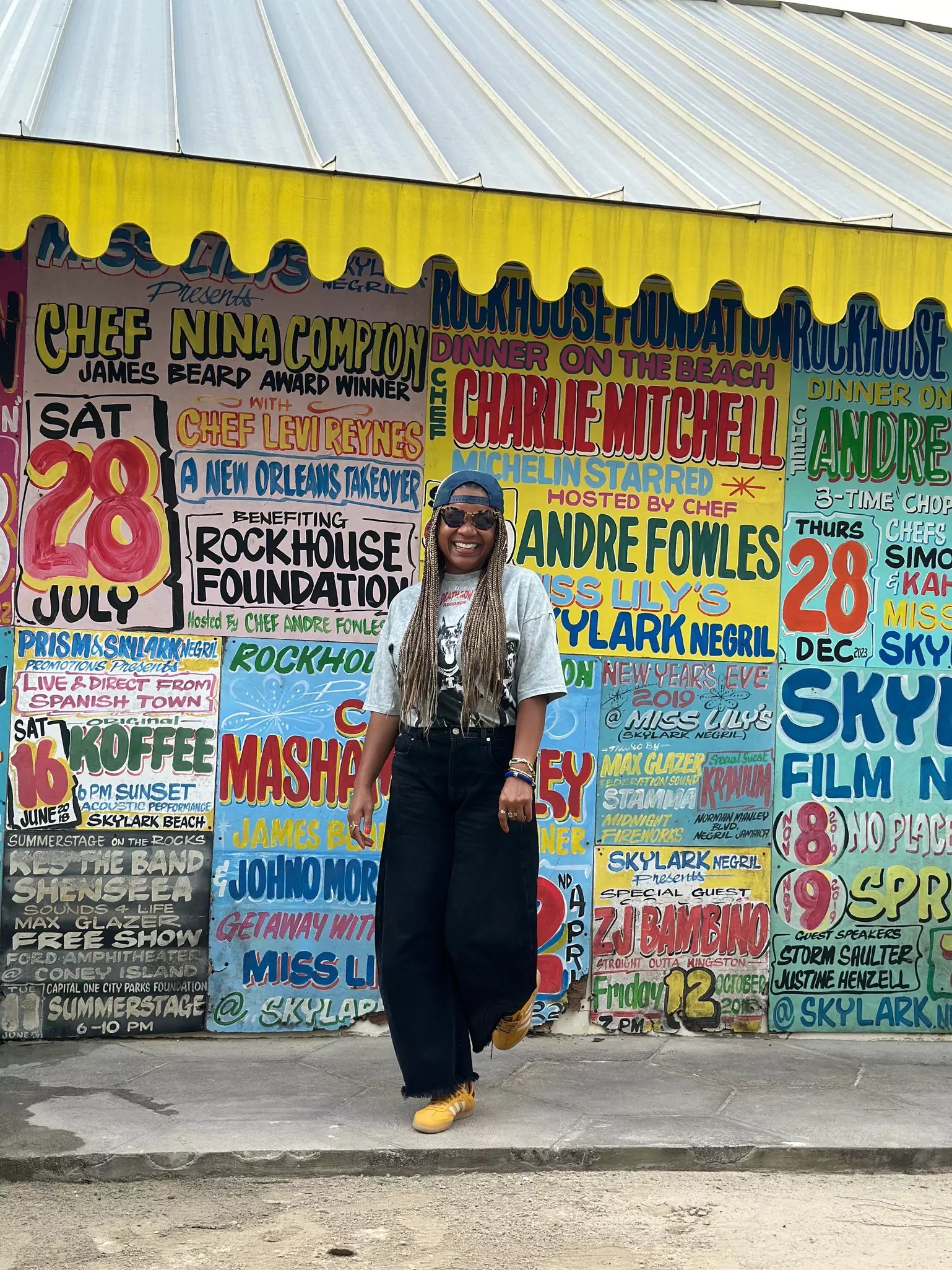 Picture of young woman against colorful wall in Negril, Jamaica