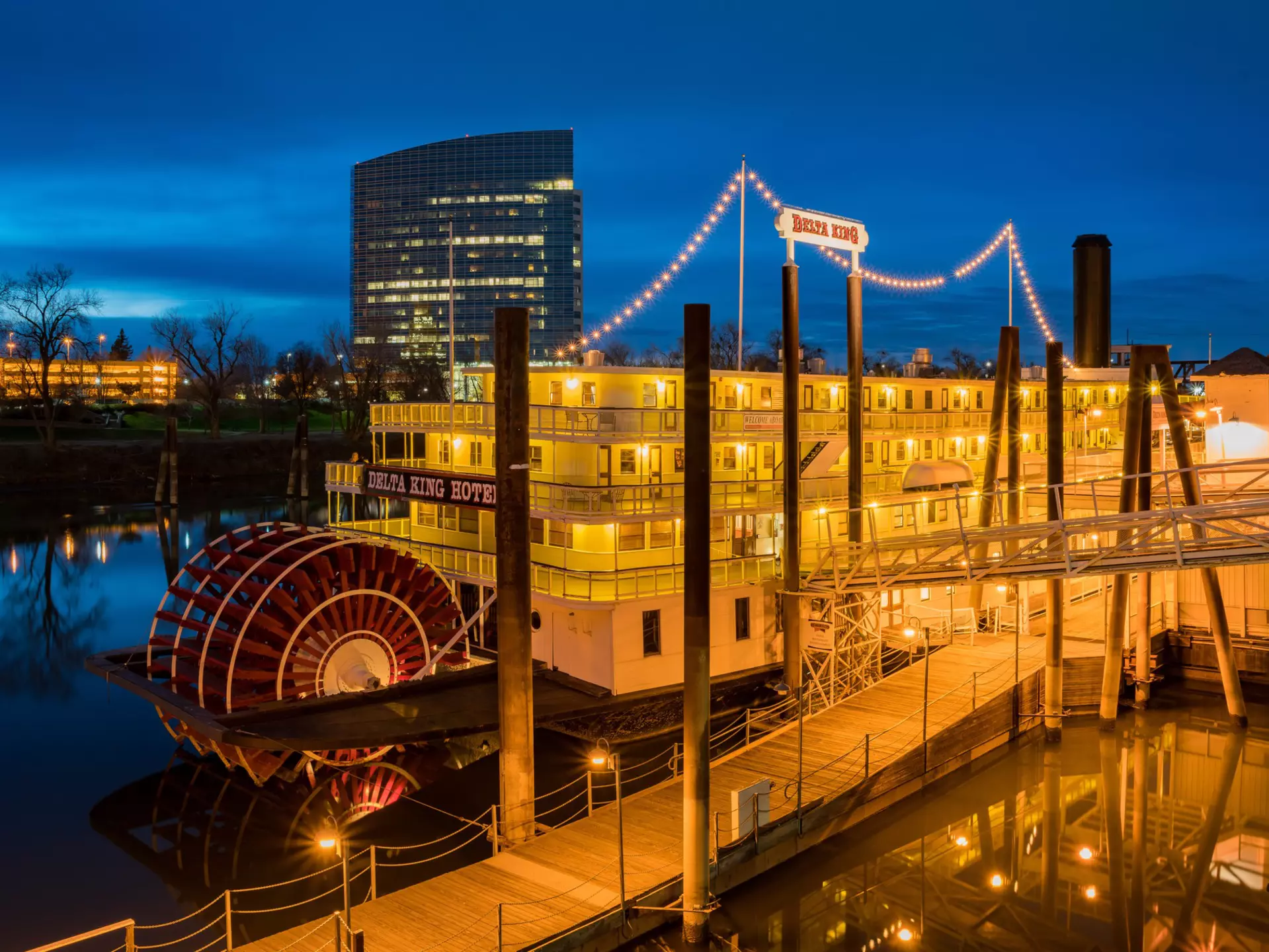 The permanently moored Delta King steamboat by night, now a hotel in Downtown Sacramento, California, USA