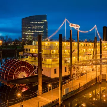 The permanently moored Delta King steamboat by night, now a hotel in Downtown Sacramento, California, USA