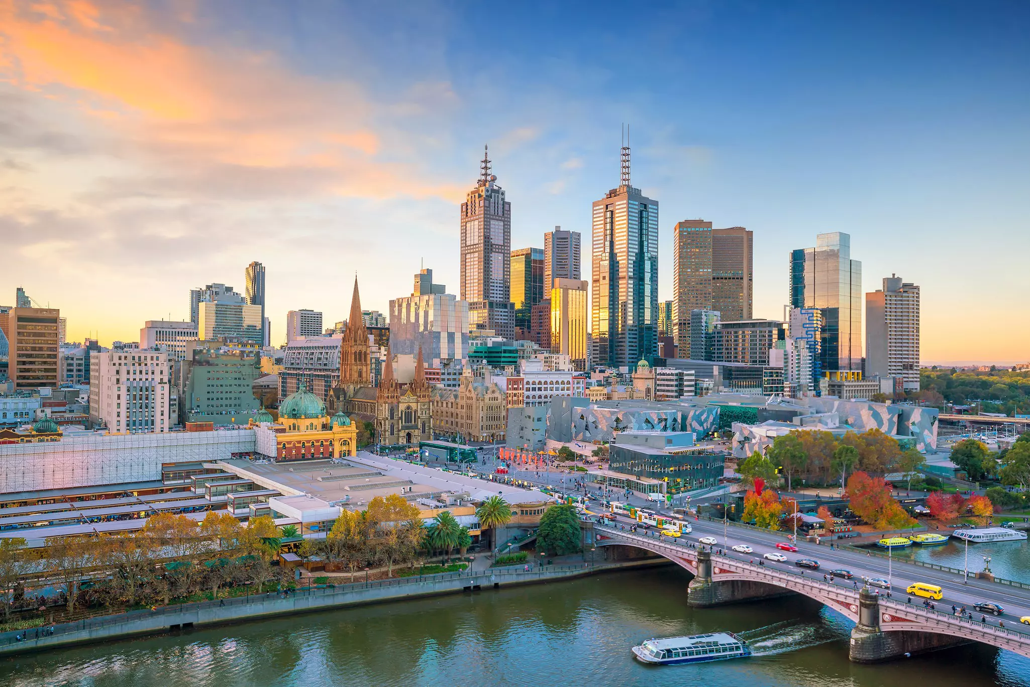Aerial view of Melbourne city skyline at twilight.