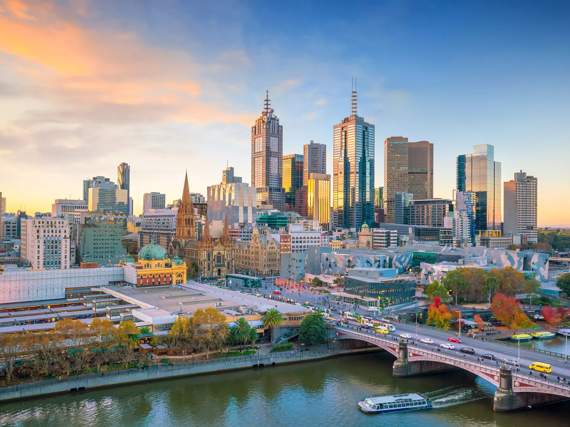 Aerial view of Melbourne city skyline at twilight.