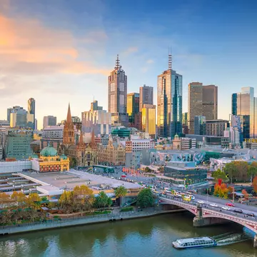 Aerial view of Melbourne city skyline at twilight.