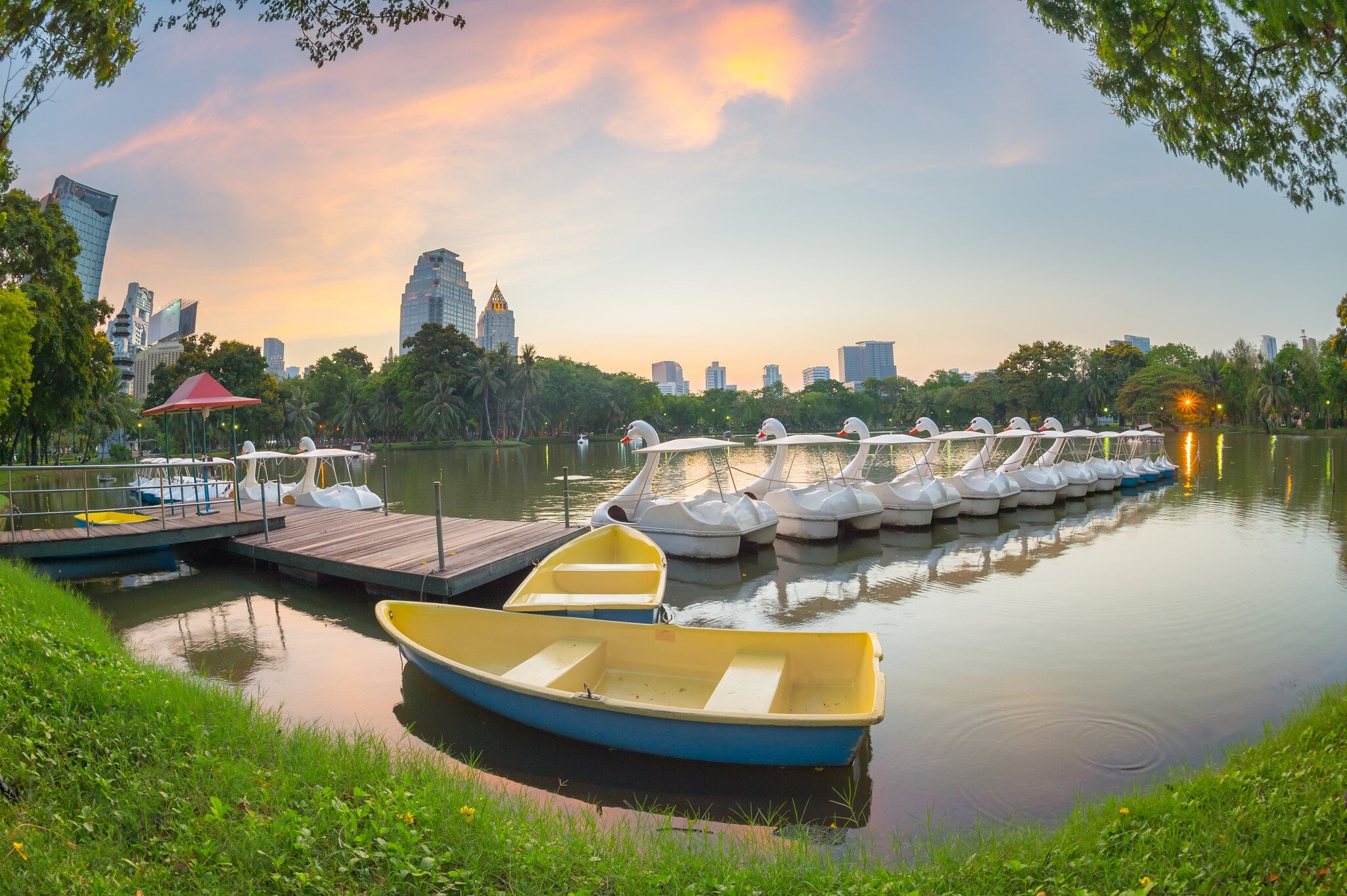 Swan pedal boats on the lake at Lumphini Park, Bangkok, Thailand