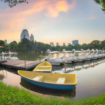 Swan pedal boats on the lake at Lumphini Park, Bangkok, Thailand