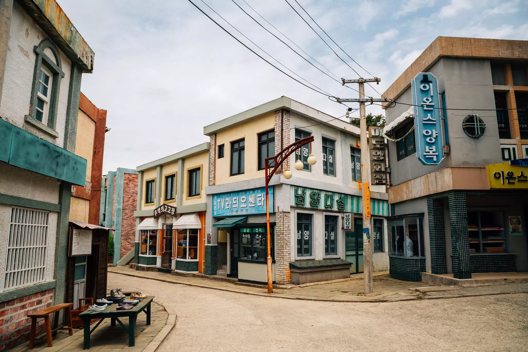 A K-Drama film set: empty streets of fake businesses used in films