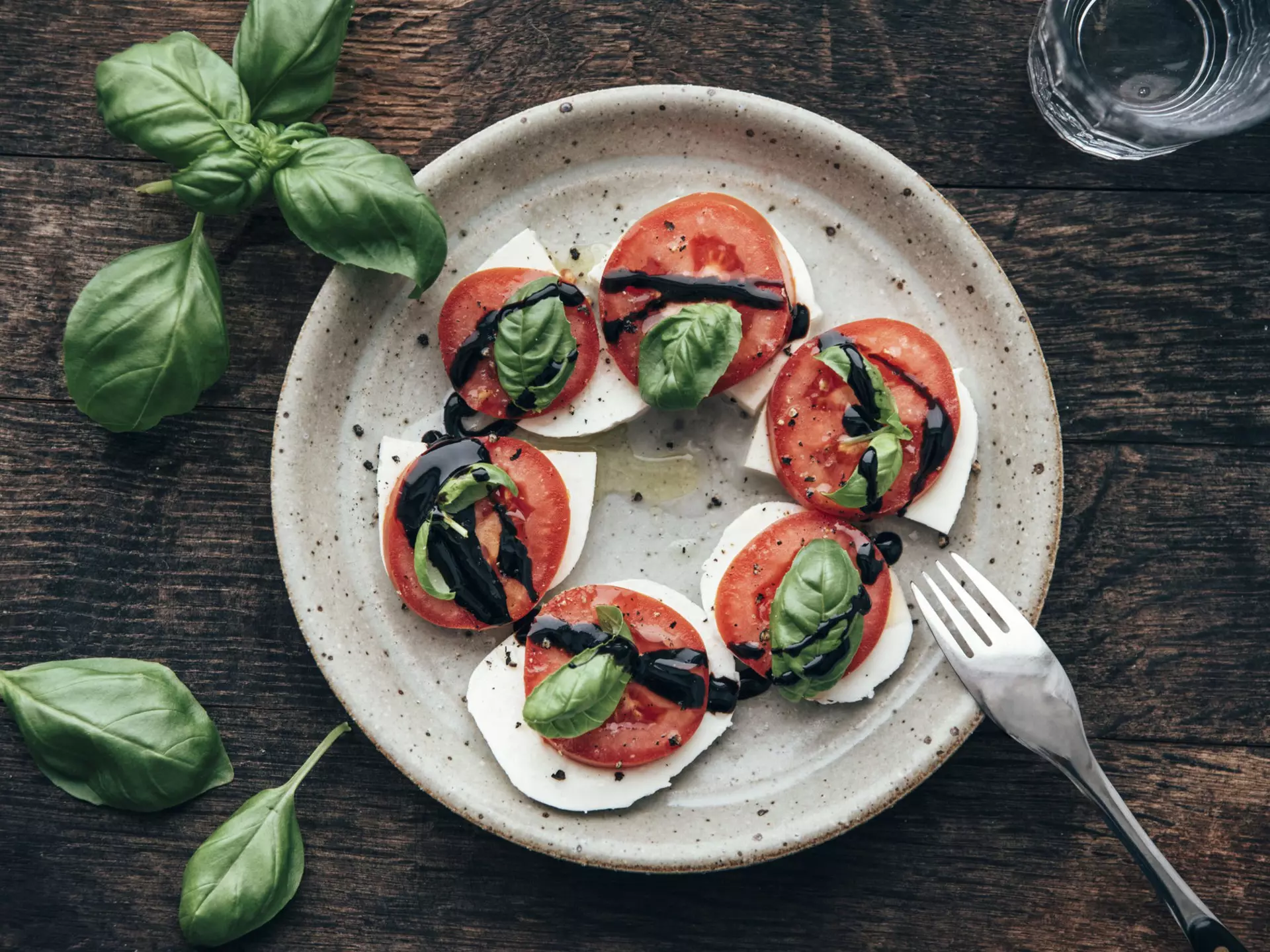 Caprese salad isn't just limited to tomatoes – use whatever's local and in season. Westend61 / Getty Images