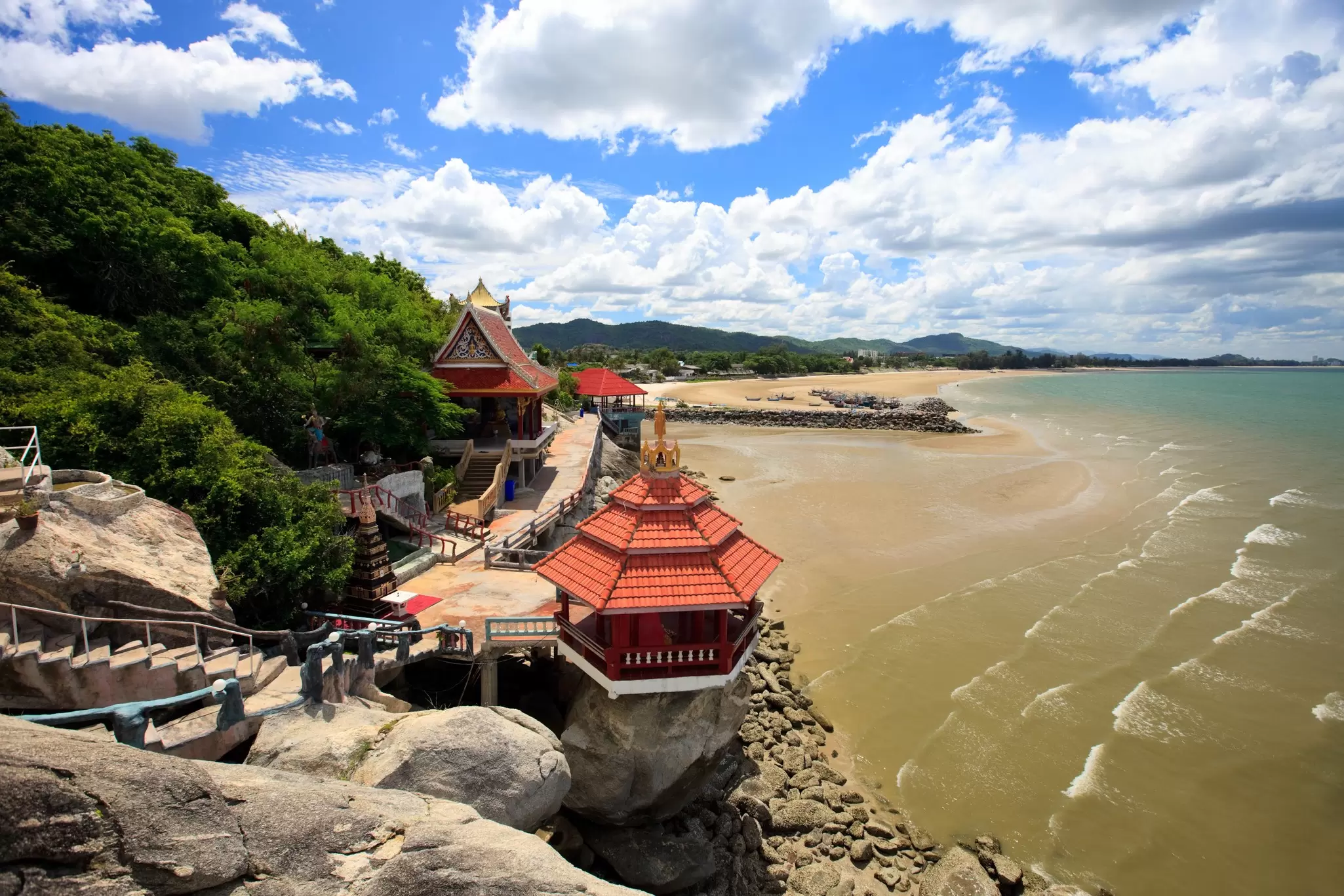 The temple and beach at Khao Tao are just one of the top day trip options from Hua Hin. Alexander Shalamov / Getty Images