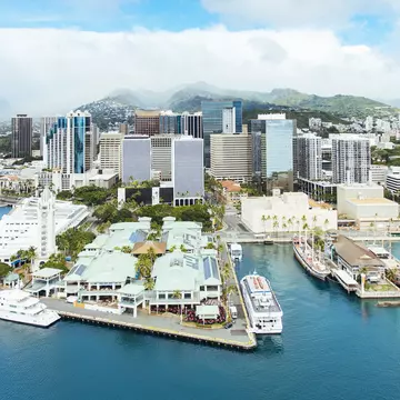 Aerial of Honolulu Harbor, Aloha Tower & Marketplace and the downtown city skyline.
1160560358
Business, Travel Destinations, Horizontal, Famous Place, Panoram, Panoramic, Beach, Hotel, Skyscraper, Travel, Vacations, Market - Retail Space, Honolulu, Color Image, Nature, Built Structure, Backgrounds, Cloud - Sky, Aloha Tower, Aerial View, Clock Tower, Cruise Ship, Summer, Marina, Town, Office, Oceania, Urban Skyline, Photography, City, Hawaii Islands, Mountain Range, Sky, Nautical Vessel, Oahu, Copy Space, Passenger Craft, Pacific Islands, Day, Tropical Climate, Island, City Life, Building Exterior, Sea, No People, Landscape - Scenery, Cityscape, Architecture, Outdoors, Bay of Water, Pacific Ocean, Mountain, Blue, Coastline, Harbor, USA, Water