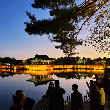 Donggung Palace reflected in Wolji Pond at dusk