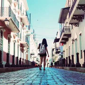 Chic hotels and contemporary galleries nudge up against trendy restaurants and cocktail bars on the cobblestone streets of Old San Juan © Hayden Williams / Stocksy