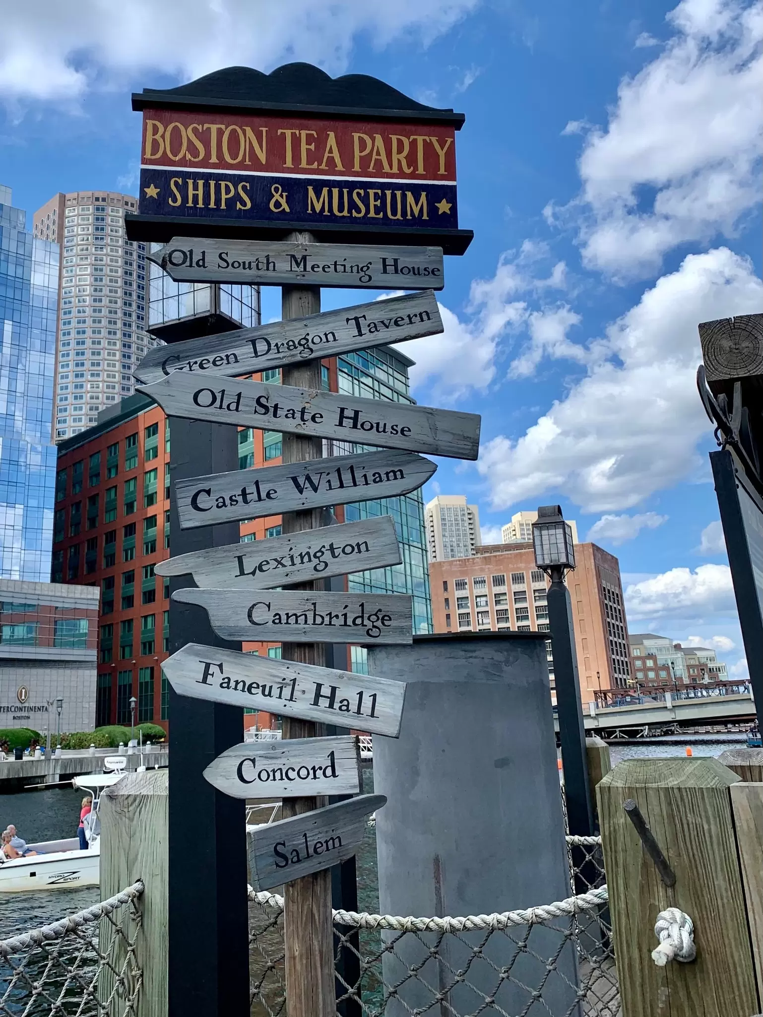 A sign at the Boston Tea Party Ships and Museum that points to the direction of several key places in the city of Boston, Massachusetts.