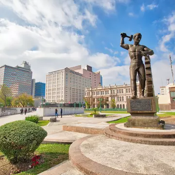 Monterrey, Mexico-11 December, 2018: Monterrey, Monument to Workers (Monumento a los Obreros) at landmark Macroplaza (La Gran Plaza) square in historic city center; Shutterstock ID 1303289980;