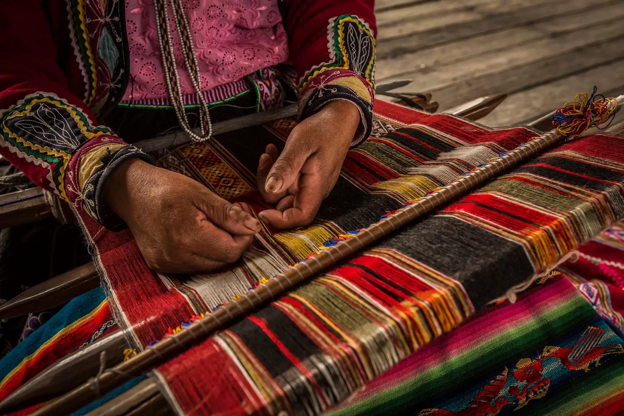 Weaving cooperatives in and around Arequipa produce brilliantly colored textiles. Christian Declercq / Getty Images