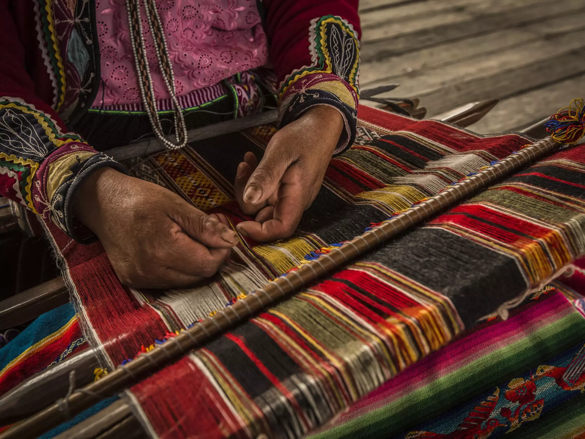 Weaving cooperatives in and around Arequipa produce brilliantly colored textiles. Christian Declercq / Getty Images