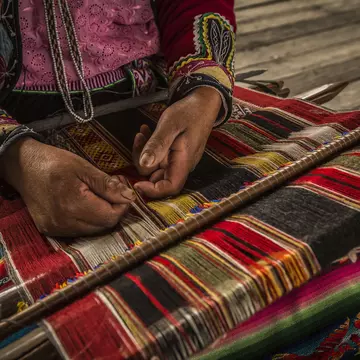 Weaving cooperatives in and around Arequipa produce brilliantly colored textiles. Christian Declercq / Getty Images