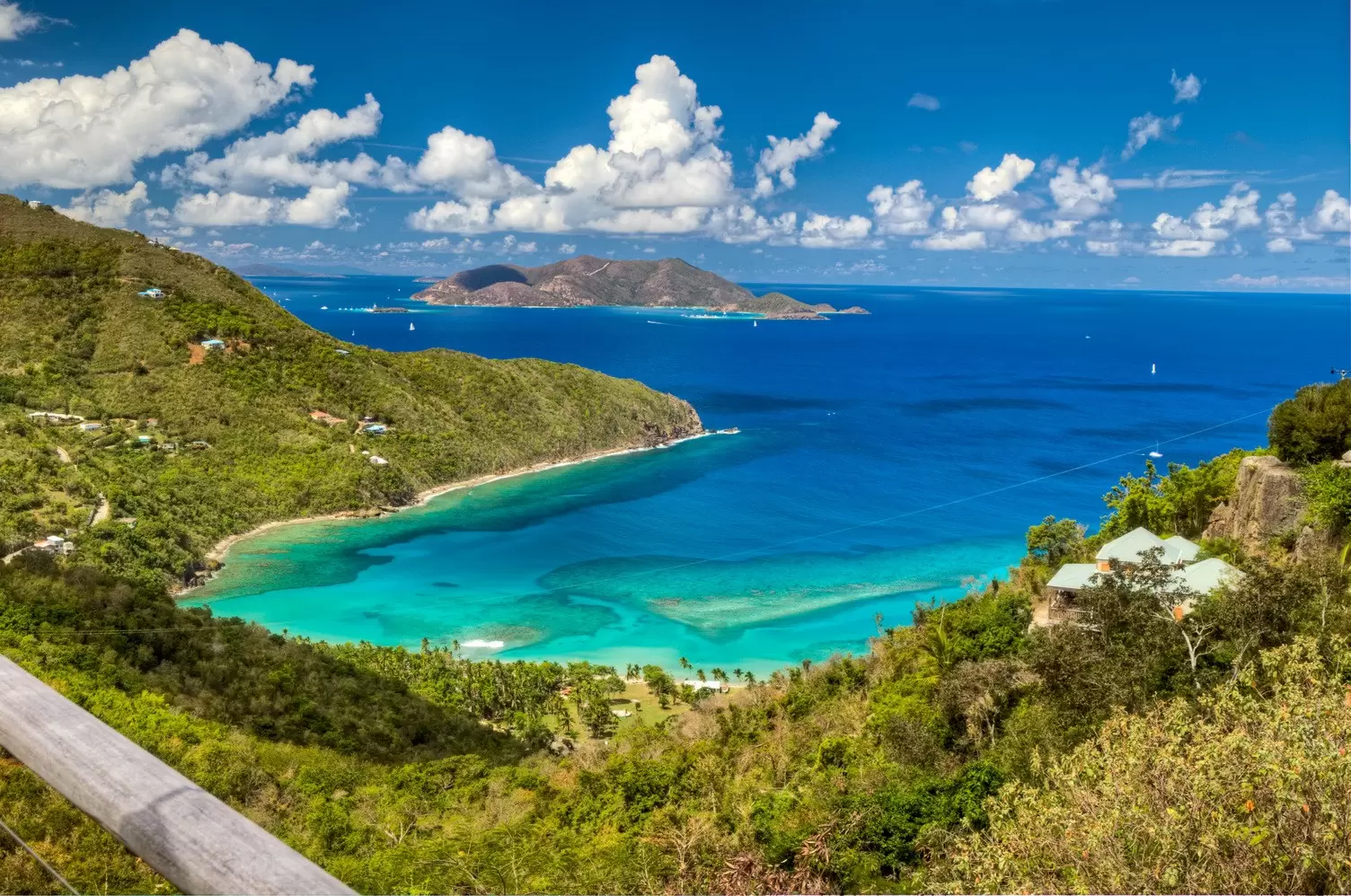 Views like this one of Brewers Bay are one of the many reasons to visit the British Virgin Islands. BVI Tourism.