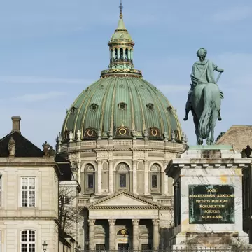 Frederik V statue at Amalienborg Slot and Marmorkirken. Copenhagen, Denmark.