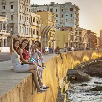 You can soak up the atmosphere of Havana's 7-mile-long Malecón promenade for free © xavierarnau / Getty Images