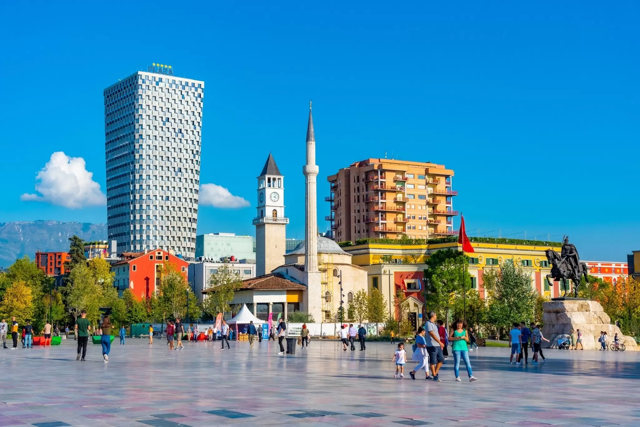 Multiple eras of architecture in the main square in Tirana, Albania. 
