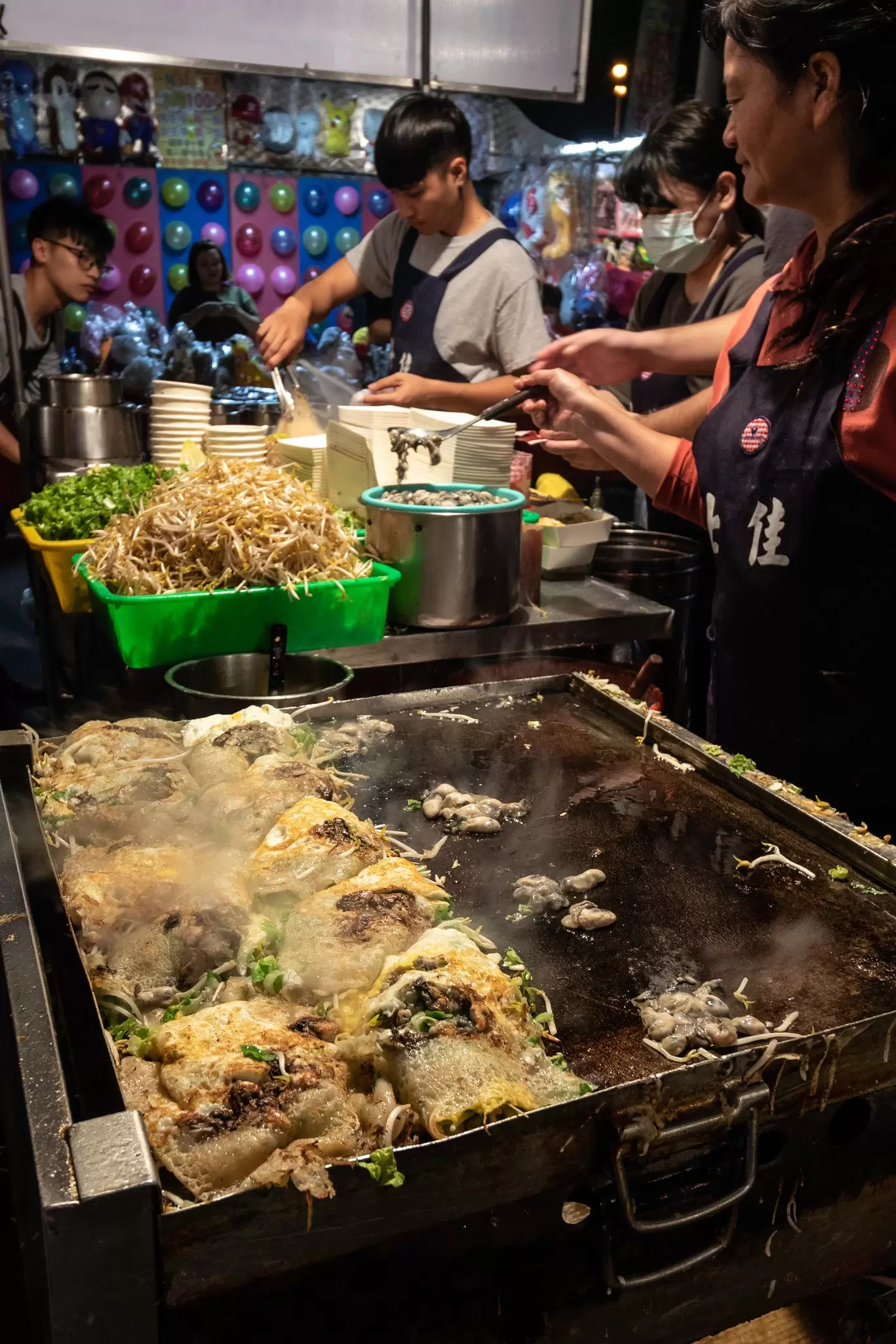 Tainan, Taipei Traditional fried oyster omelette at the Tainan Flower Night Market.