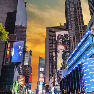 Advertisements in Times Square at sunset