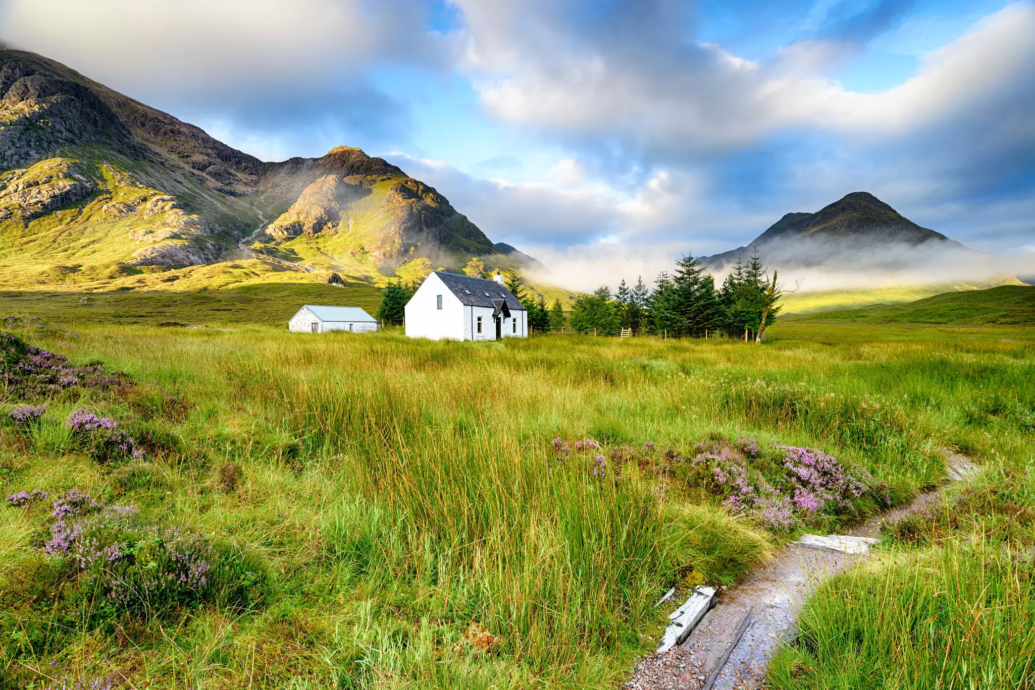 A picture postcard cottage at Glencoe in the Scottish Highlands.