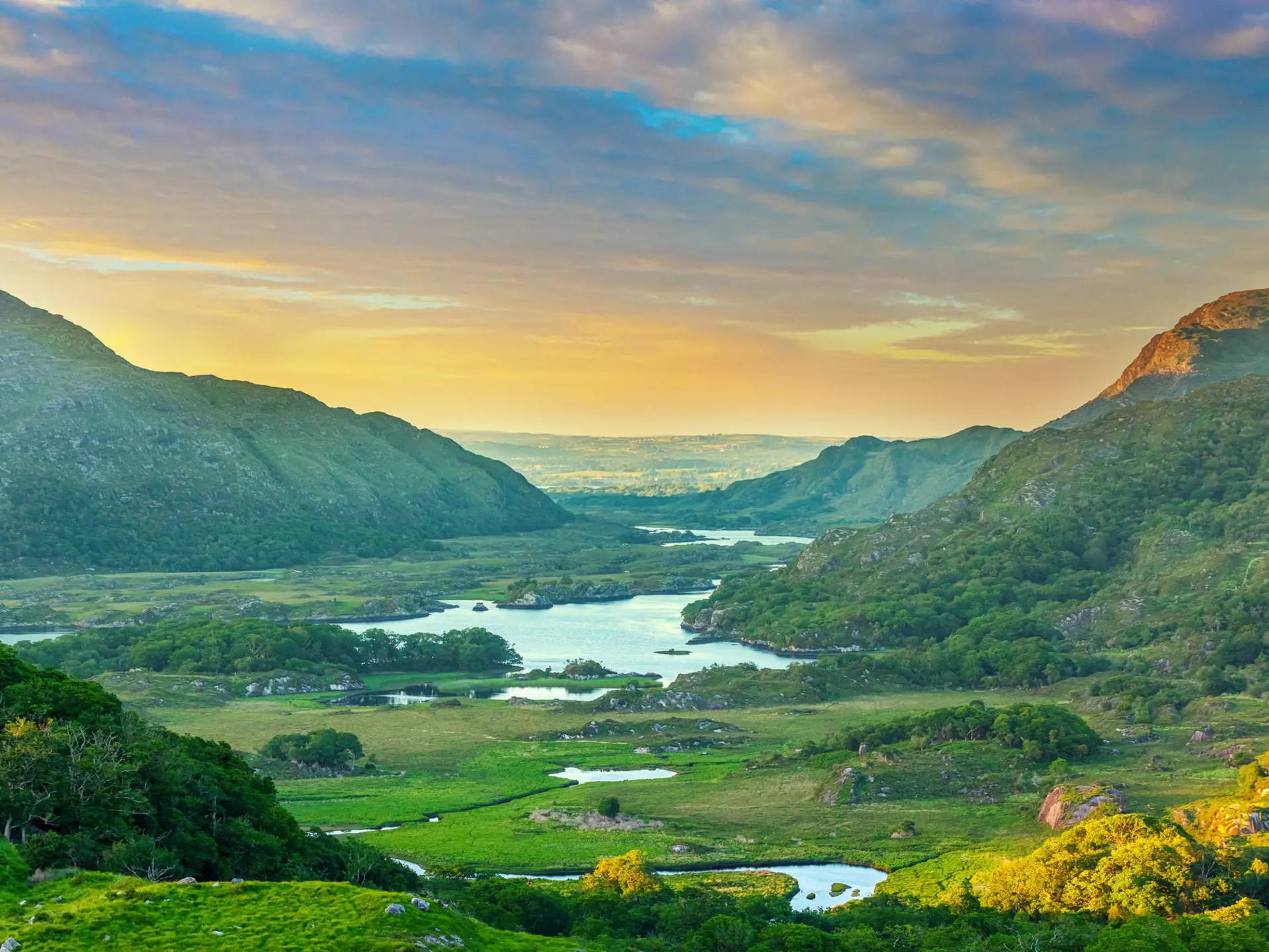 Valley in the Ring of Kerry, as seen from the Ladies View in Killarney National Park.
512665426
Ring of Kerry, Horizontal, County Kerry, Scenics - Nature, Munster Province - Ireland, Cloudscape, Nature, No People, Dawn, Mountain Range, Sunrise - Dawn, Ireland, Lake, Photography, Lakes Of Killarney, Killarney - Ireland, Republic of Ireland, Mountain, Sunset, Killarney National Park - Ireland, Green Color, Dusk, Outdoors, Moody Sky, Forest, Morning, Landscape - Scenery, Cloud - Sky, Color Image